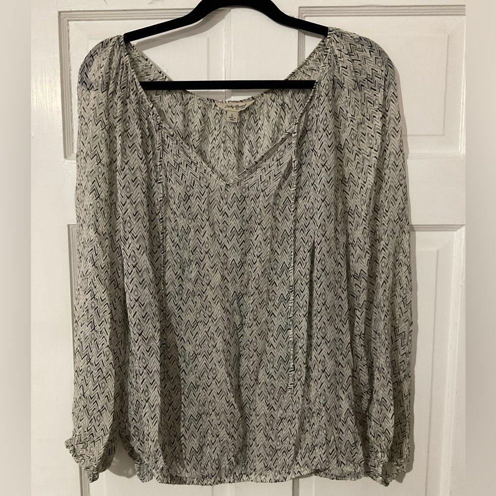 Black and cream blouse
